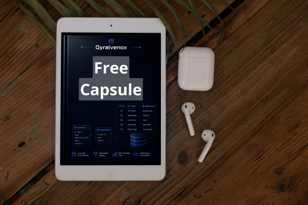 A white tablet on a wooden surface displaying a software interface that reads 'Cyrilvenox Free Capsule,' with a white earbud charging case and two white wireless earbuds placed beside it.